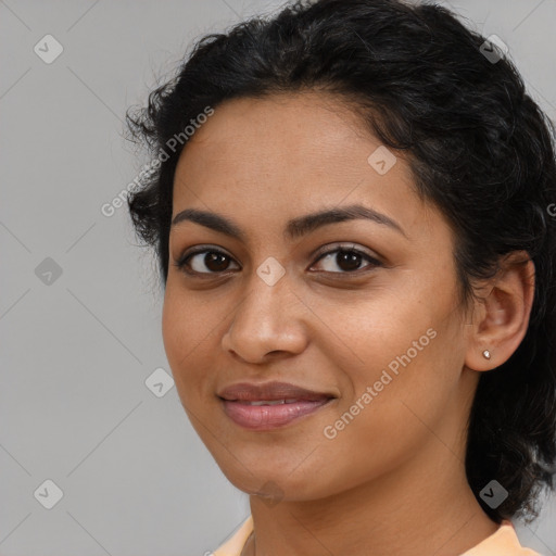 Joyful latino young-adult female with medium  black hair and brown eyes