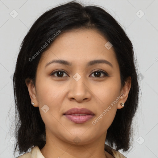 Joyful latino young-adult female with long  brown hair and brown eyes