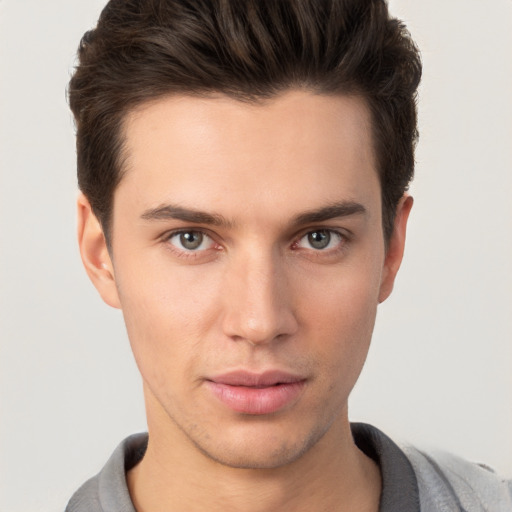 Neutral white young-adult male with short  brown hair and brown eyes