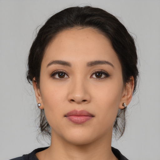 Neutral latino young-adult female with medium  black hair and brown eyes
