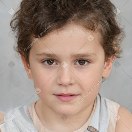 Joyful white child male with short  brown hair and brown eyes