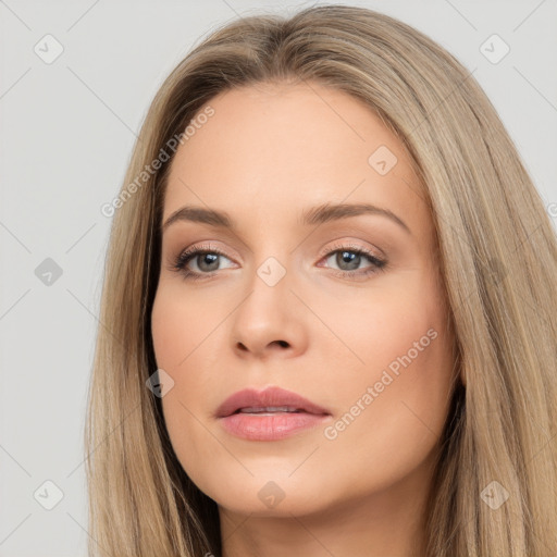 Neutral white young-adult female with long  brown hair and brown eyes