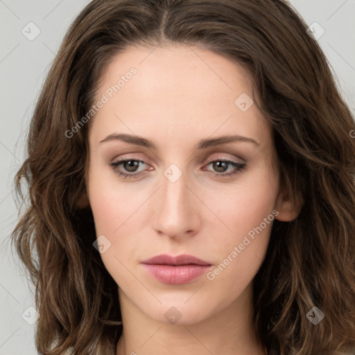 Neutral white young-adult female with long  brown hair and green eyes