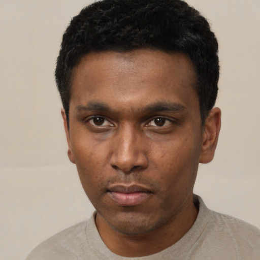 Neutral black young-adult male with short  black hair and brown eyes