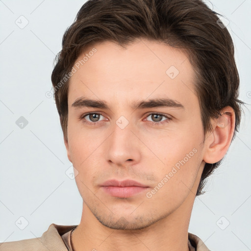 Neutral white young-adult male with short  brown hair and brown eyes