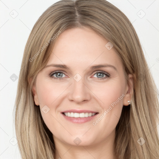 Joyful white young-adult female with long  brown hair and grey eyes