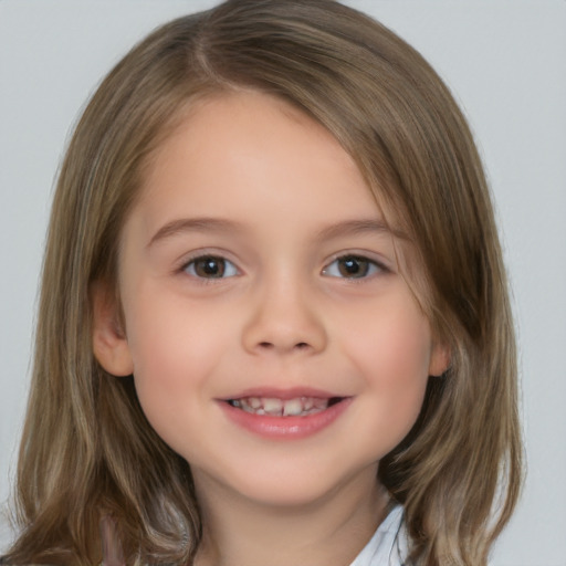 Joyful white child female with medium  brown hair and brown eyes