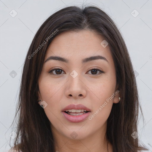 Joyful white young-adult female with long  brown hair and brown eyes