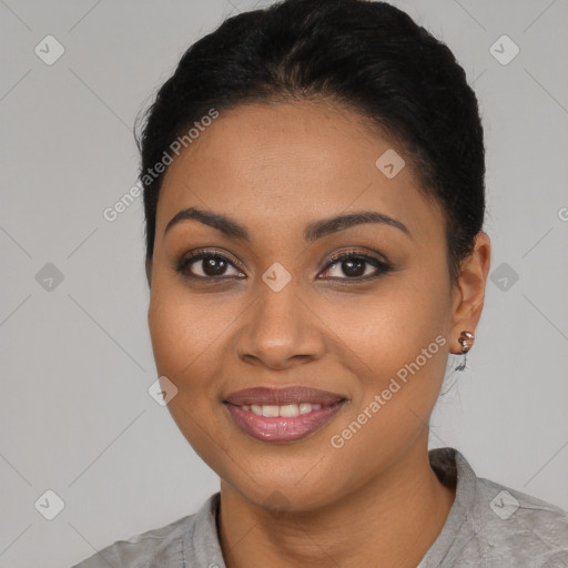 Joyful latino young-adult female with short  black hair and brown eyes