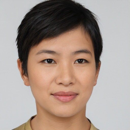 Joyful asian young-adult female with short  black hair and brown eyes