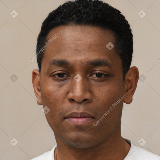 Neutral black young-adult male with short  black hair and brown eyes
