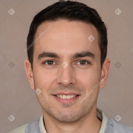 Joyful white young-adult male with short  brown hair and brown eyes