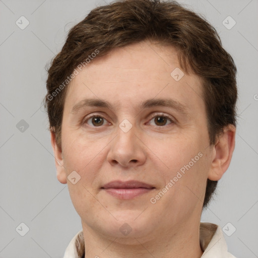 Joyful white adult female with short  brown hair and brown eyes