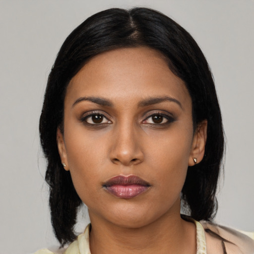 Neutral asian young-adult female with medium  black hair and brown eyes