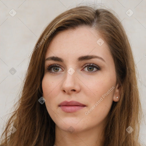 Neutral white young-adult female with long  brown hair and brown eyes