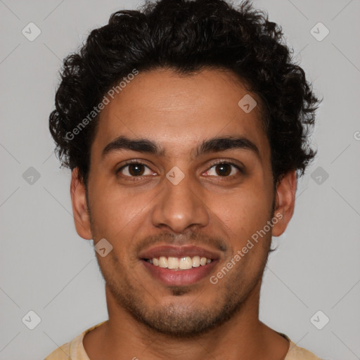 Joyful latino young-adult male with short  brown hair and brown eyes