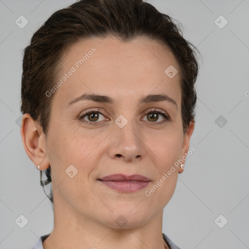 Joyful white adult female with short  brown hair and brown eyes