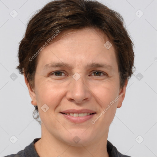 Joyful white adult male with short  brown hair and grey eyes