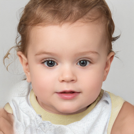 Neutral white child female with short  brown hair and blue eyes