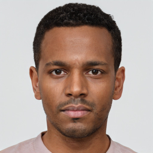 Neutral black young-adult male with short  black hair and brown eyes