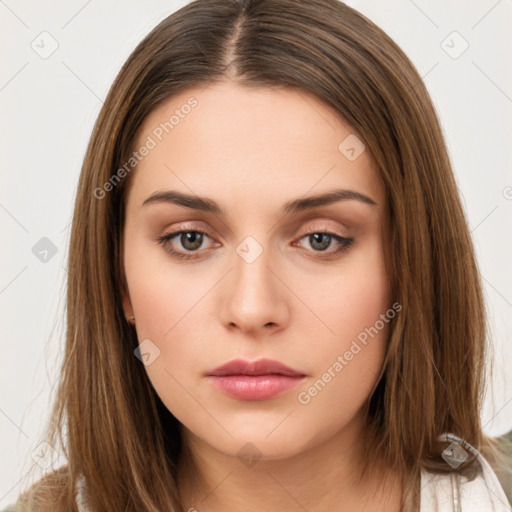 Neutral white young-adult female with long  brown hair and brown eyes