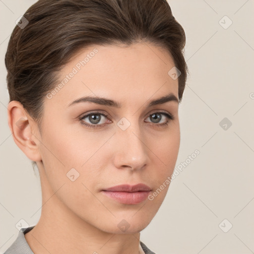 Neutral white young-adult female with short  brown hair and brown eyes