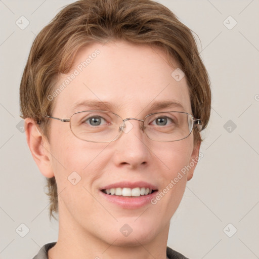 Joyful white adult female with short  brown hair and grey eyes