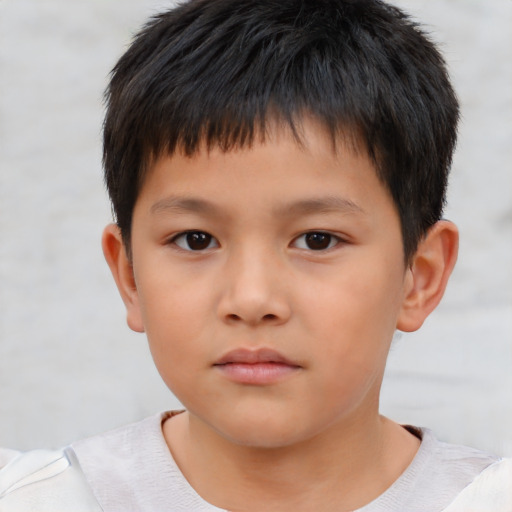 Neutral asian child male with short  brown hair and brown eyes