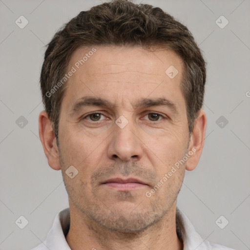 Neutral white adult male with short  brown hair and brown eyes