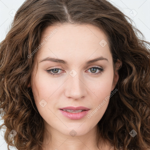 Joyful white young-adult female with long  brown hair and green eyes