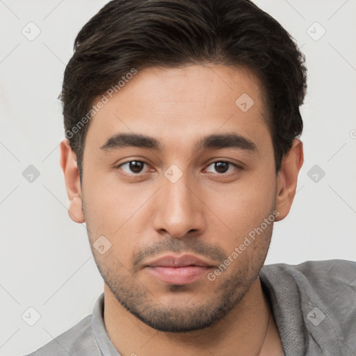 Neutral white young-adult male with short  brown hair and brown eyes