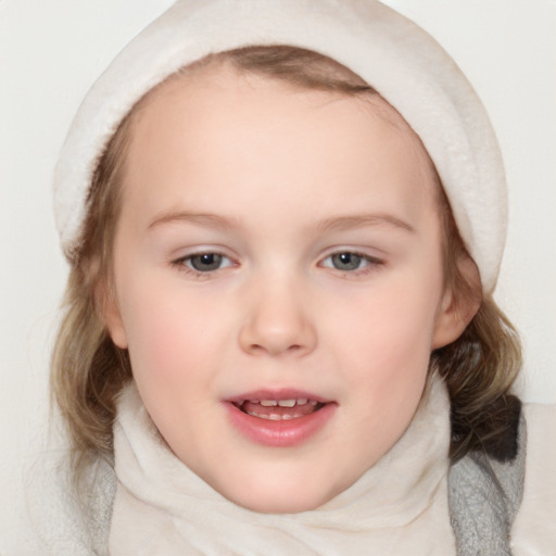 Joyful white child female with medium  brown hair and blue eyes