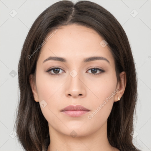 Neutral white young-adult female with long  brown hair and brown eyes