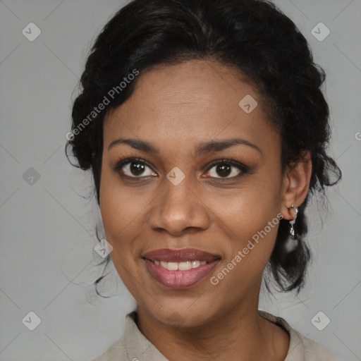 Joyful black adult female with medium  black hair and brown eyes