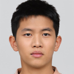 Neutral asian young-adult male with short  brown hair and brown eyes