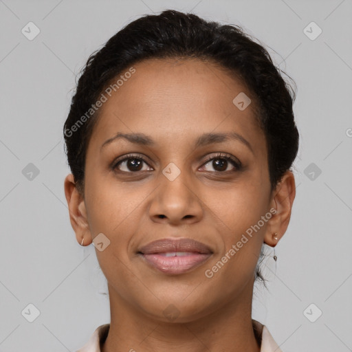 Joyful latino young-adult female with short  brown hair and brown eyes