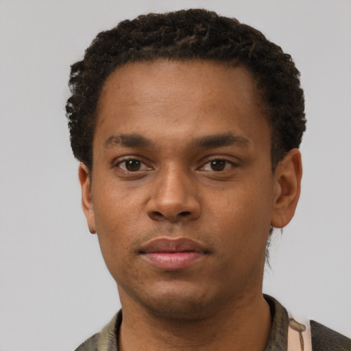 Neutral black young-adult male with short  brown hair and brown eyes