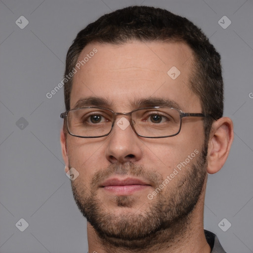 Neutral white adult male with short  brown hair and brown eyes