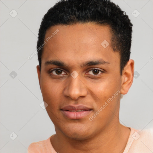 Joyful latino young-adult male with short  black hair and brown eyes