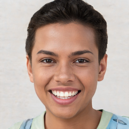 Joyful white young-adult female with short  brown hair and brown eyes