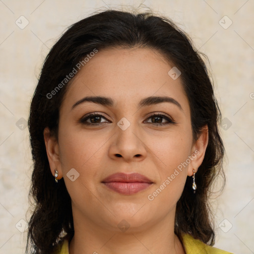 Joyful latino young-adult female with long  brown hair and brown eyes