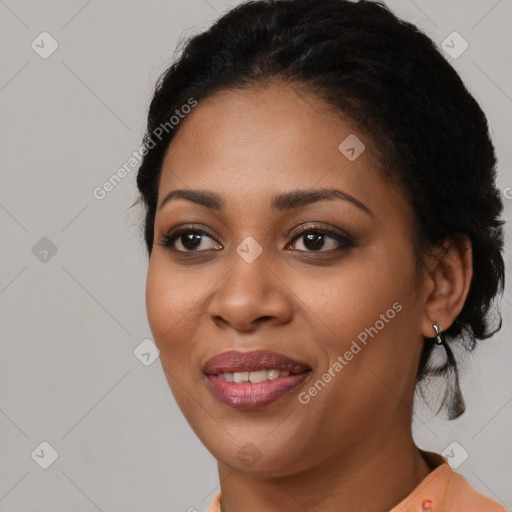 Joyful latino young-adult female with medium  black hair and brown eyes