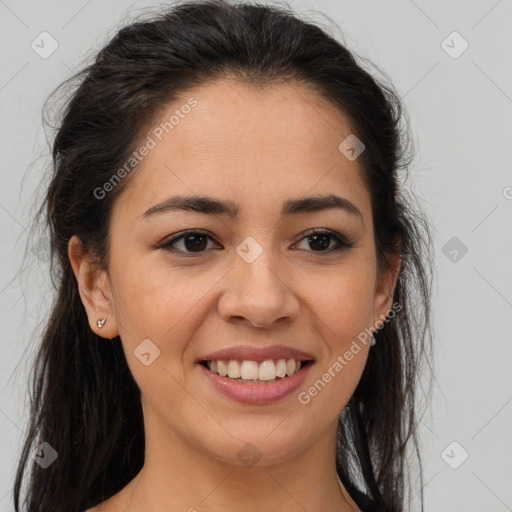 Joyful latino young-adult female with long  brown hair and brown eyes