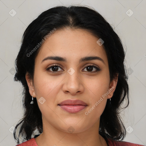 Joyful latino young-adult female with medium  brown hair and brown eyes