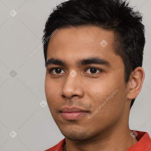 Neutral latino young-adult male with short  black hair and brown eyes