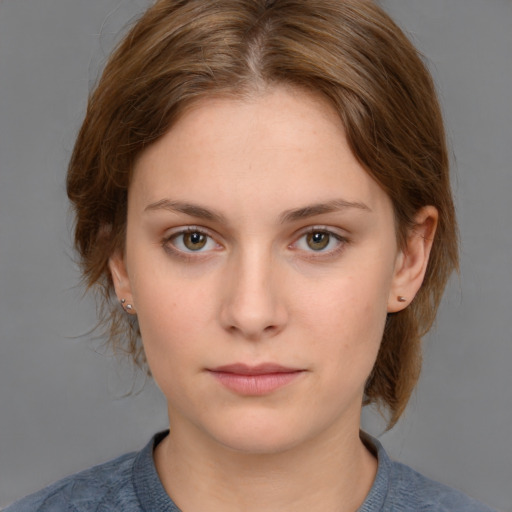 Neutral white young-adult female with medium  brown hair and grey eyes