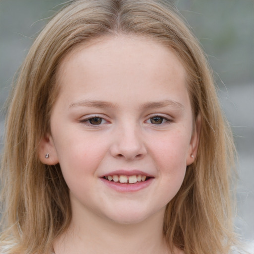 Joyful white child female with medium  brown hair and blue eyes