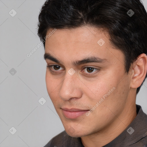 Neutral white young-adult male with short  brown hair and brown eyes