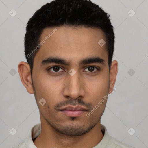 Neutral latino young-adult male with short  black hair and brown eyes