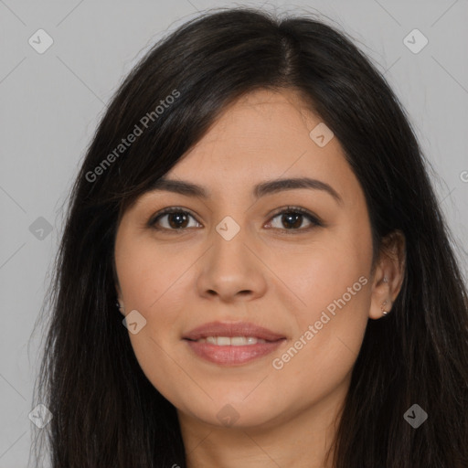 Joyful latino young-adult female with long  brown hair and brown eyes